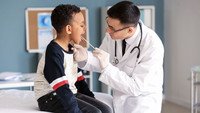  Boy is examined by a doctor. 