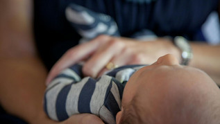 baby on arm